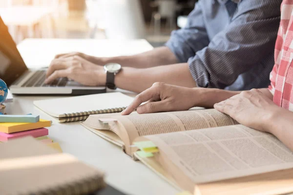 woman and man studying for a test/ an exam