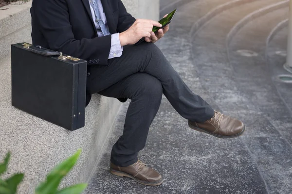 Business man using smartphone — Stock Photo, Image