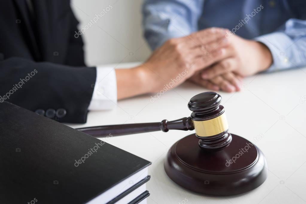 businessman and lawyer discussing contract papers