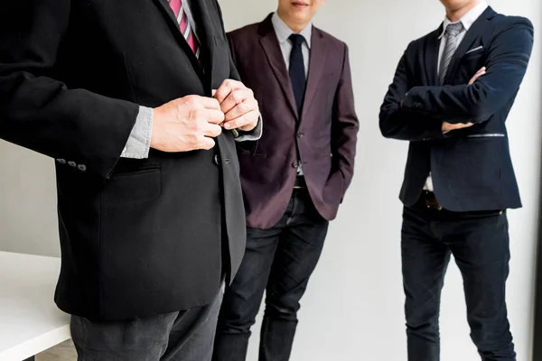 Group of business people with businessman leader standing with a