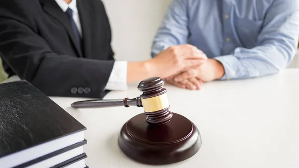 Judge gavel with lawyers advice legal at law firm in background. — Stock Photo, Image