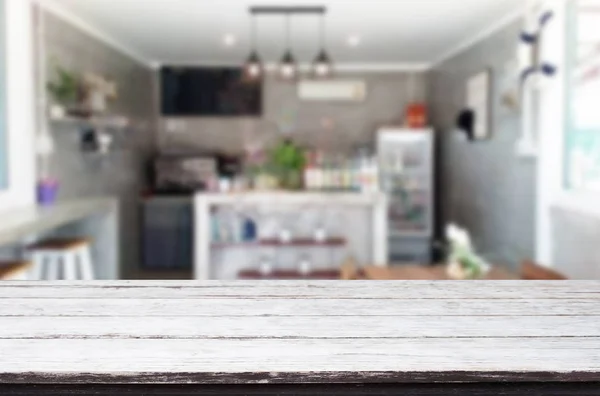 Selected focus empty brown wooden table and Coffee shop or resta