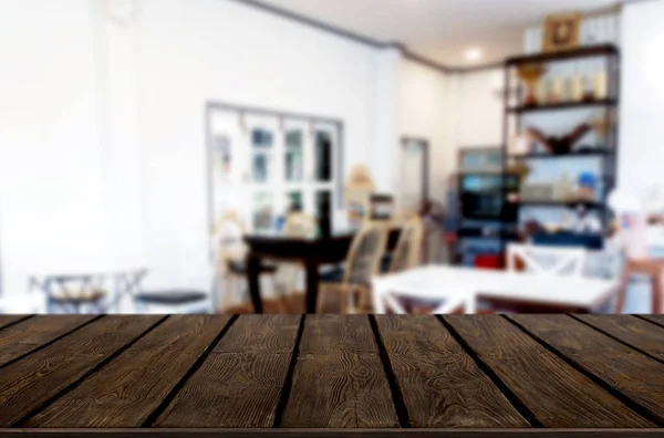 Selected focus empty brown wooden table and Coffee shop or resta