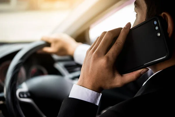 Attractive handsome young businessman using mobile smart phone i — Stock Photo, Image