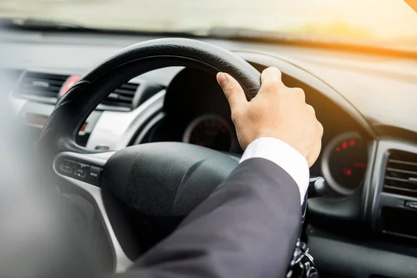 Portrait of a young handsome businessman driving a luxury sports — Stock Photo, Image