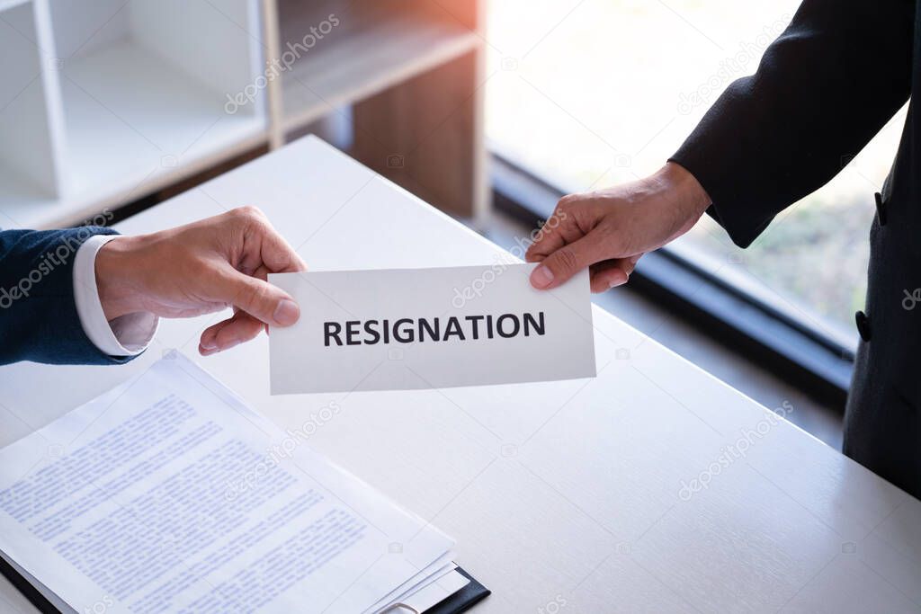 Employee businessman submit or sending resignation document letter to human resource manager or boss, Change of job, unemployment, resign concept