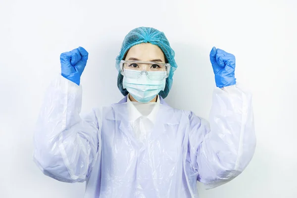 Scientist doctor wearing face mask, glasses or goggles and protective suit to fight coronavirus pandemic Covid-19, coronavirus pandemic threat quarantine, medical and healthcare concept