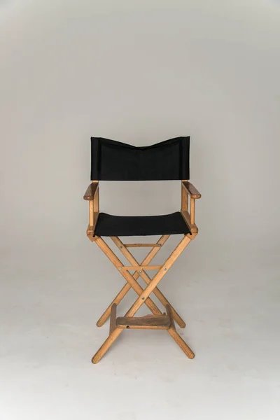 director\'s chair on a white cyclorama