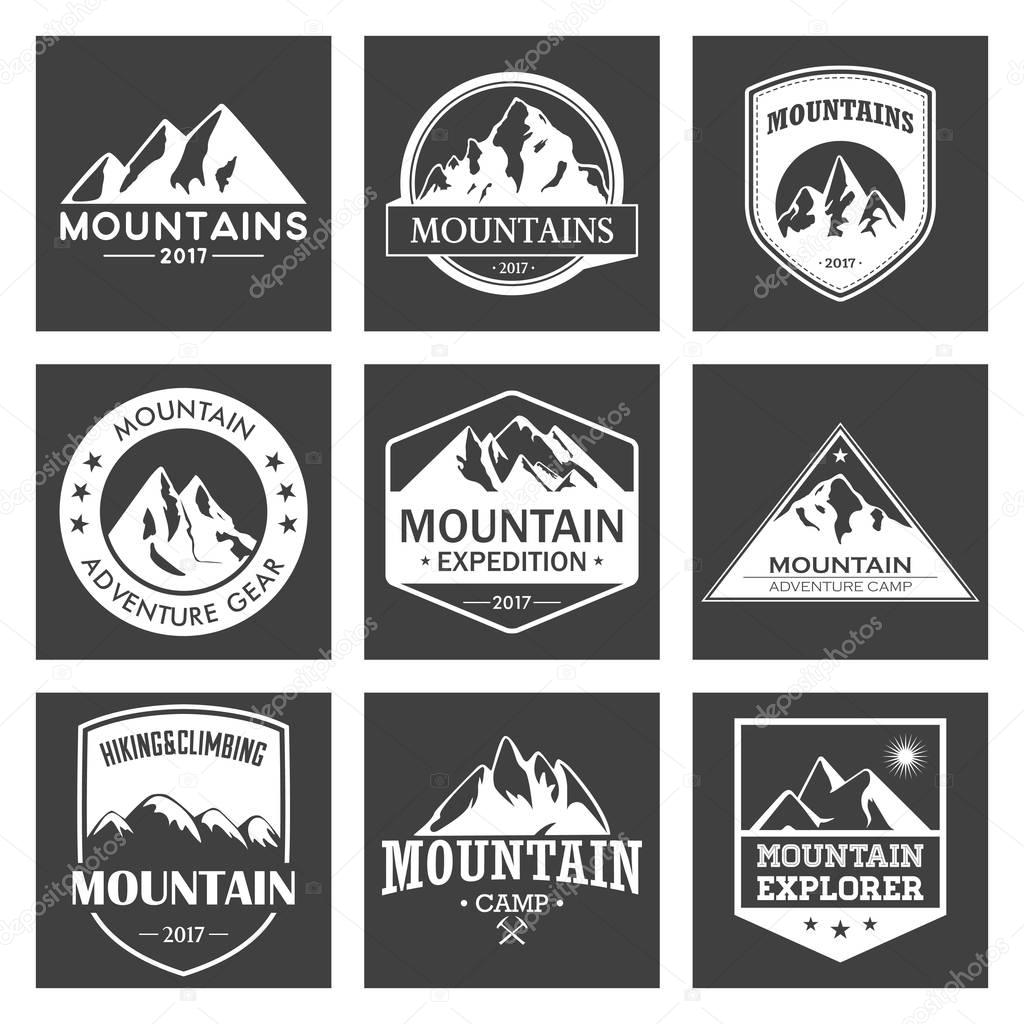 Mountain travel, outdoor adventures logo set. Hiking and climbing labels or icons for tourism organizations, events, camping leisure.