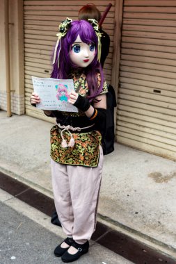 Osaka / Japonya - 18 Mart 2018: Nipponbashi Street Festa, renkli kostüm ve anime festivali her Mart ayında Japonya 'nın Osaka kentinde düzenlenir. Dünyanın en büyük kostüm etkinliklerinden biri.