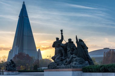 Pyongyang / DPR Korea - November 12, 2015: Ryugyong hotel is an unfinished 105 story, 330 meter tall pyramid shaped skyscraper in Pyongyang and the tallest structure in North Korea clipart