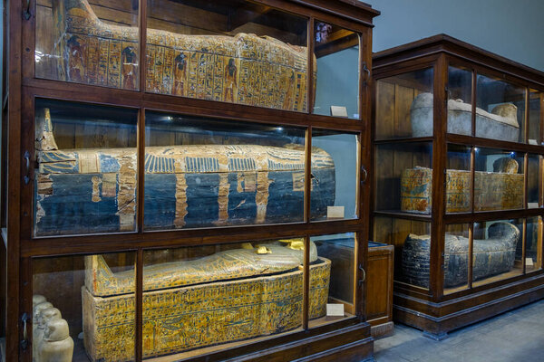 Cairo / Egypt - May 25, 2019: Ancient Egyptian sarcophagi and mummy caskets displayed in the Museum of Egyptian Antiquities (Egyptian Museum) in Cairo, capital of Egypt