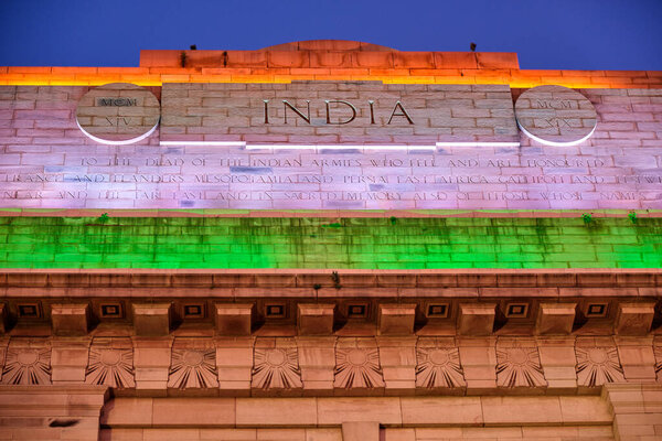 India Gate war memorial in New Delhi, India, illuminated in colors of Indian national flag