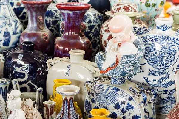 Porcelain at the Panjiayuan Antique Market, Beijing Antique Market, Beijings biggest and best known arts, crafts, and antiques flea market selling second hand goods