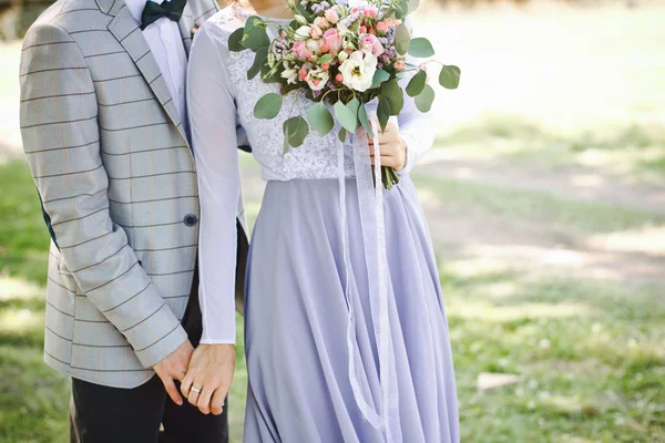 Original bouquet of flowers in the hands of the girl — Stock Photo, Image