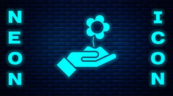 Świecący Neon Ręczne Trzymanie Ikony Kwiat Izolowane Tle Cegły Ściany — Wektor stockowy