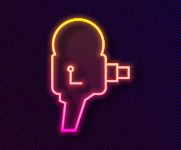 Parlayan neon hattı Retro sinema kamera ikonu siyah arkaplanda izole edildi. Video kamera. Film tabelası. Film projektörü. Vektör İllüstrasyonu