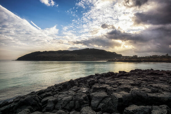 Sunrise over the black basalt