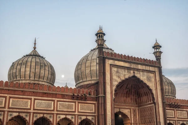 Moon over a dome — 图库照片