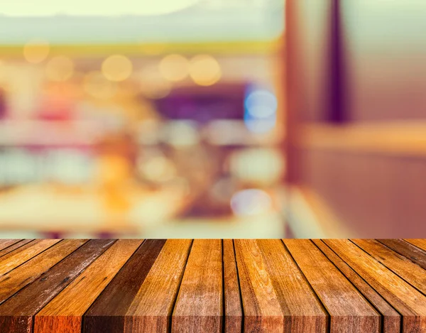 Houten tafel en onscherpte Japans restaurant . — Stockfoto