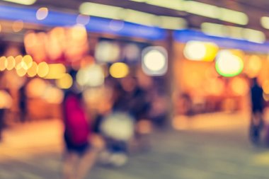 Alışveriş merkezinin bulanık görüntüsü ve arka plan kullanımı için insanlar. (Klasik ton))