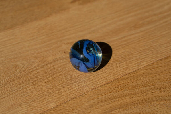 blue cristal ball on the floor