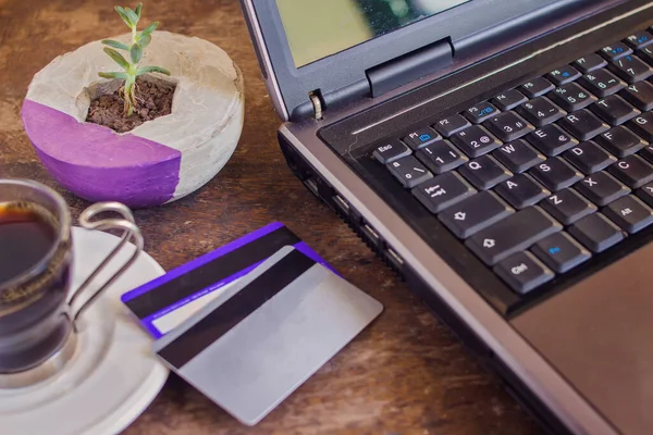 Laptop Credit Cards Cup Coffee Table Home — Stock Photo, Image