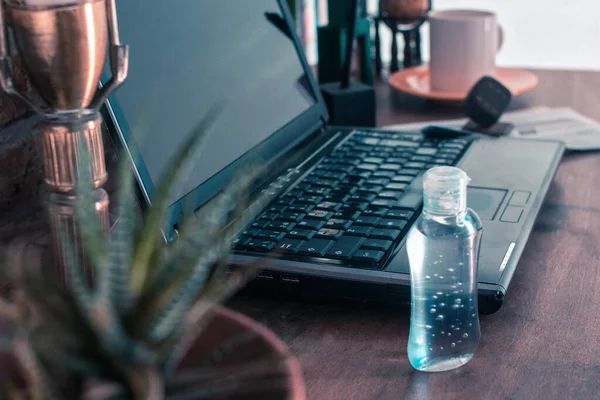 Bottle Gel Alcohol Next Laptop Desk Corner House Home Office — Stock Photo, Image