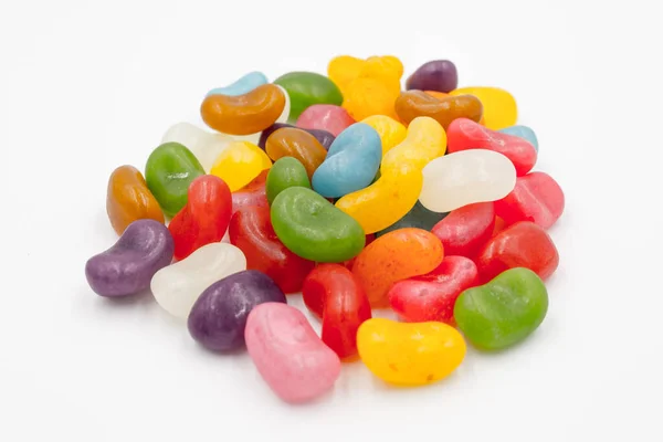 Bonbons Aux Noix Multicolores Sur Sol Blanc — Photo