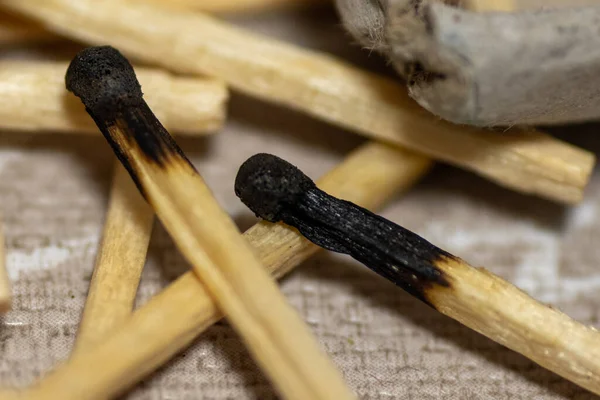 Close-up top view of a pile of burnt matches. Background. A lot of burnt matches. — Stock Image Close Top View Pile Burnt Matches Background Lot Burnt Matches Royalty Free Stock Images