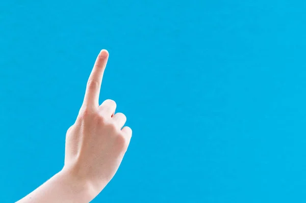Caucasian White Female Hand Forefinger Raised Pointing Blue Background Copy — Stock Photo, Image