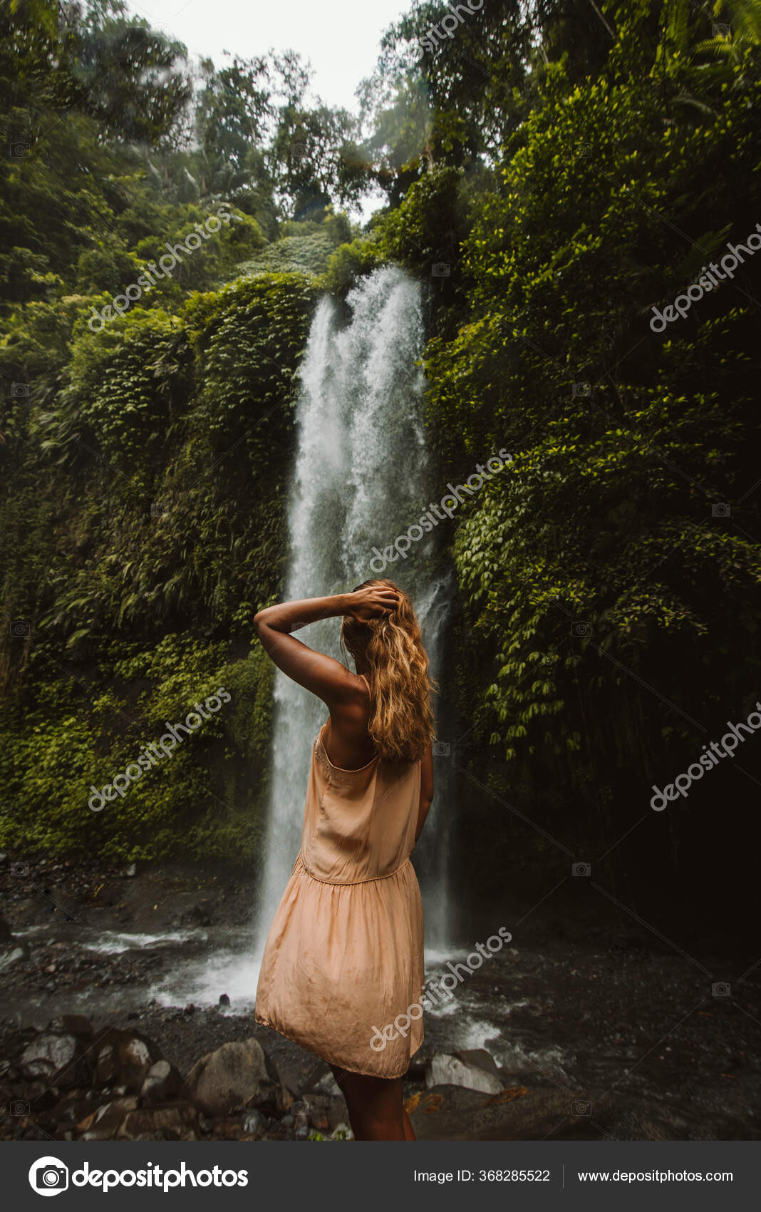 Beautiful native island girl posing in a beautiful lagoon with a waterfall  in a beautiful jungle. 8k. ultra high resolution. hyper detailed. fine  details. photorealistic. ray tracing on Craiyon