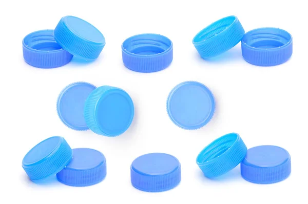 beyaz zemin üzerine mavi plastik şişe kapağı