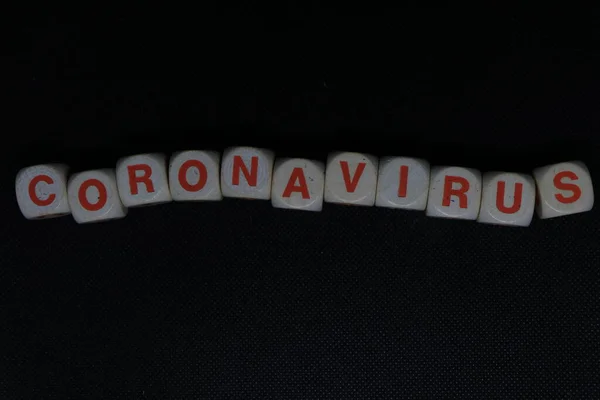 "CORONAVIRUS" written on a black background — Stock Photo, Image