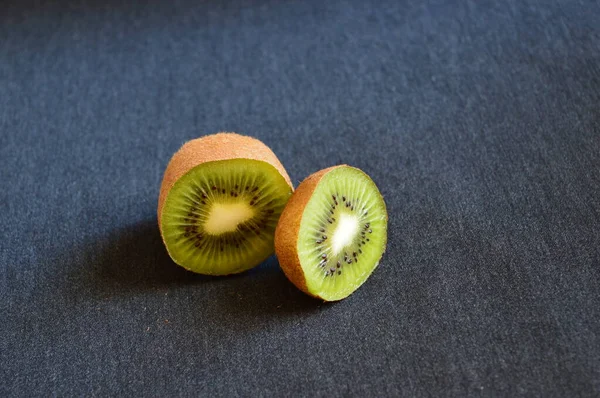 kiwi fruit on black background