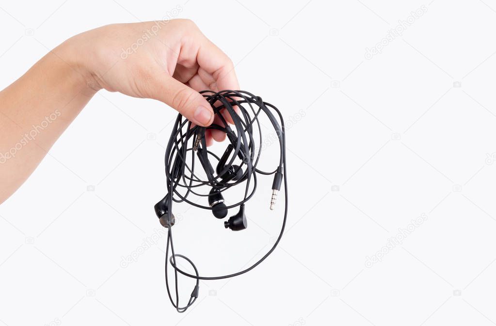 A woman hand holding earphones 