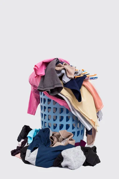 Basket with laundry on white background — Stock Photo, Image