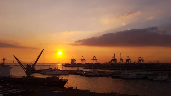 sunset in the port of Manila, Philippines. no filters