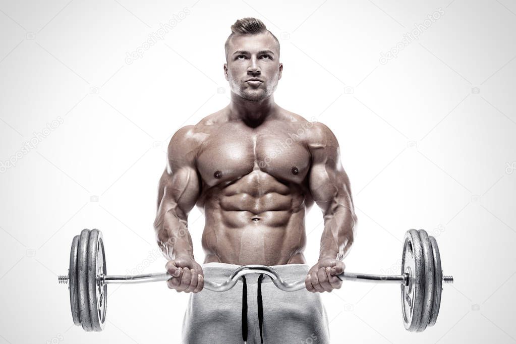 Muscular bodybuilder guy doing exercises with big dumbbell