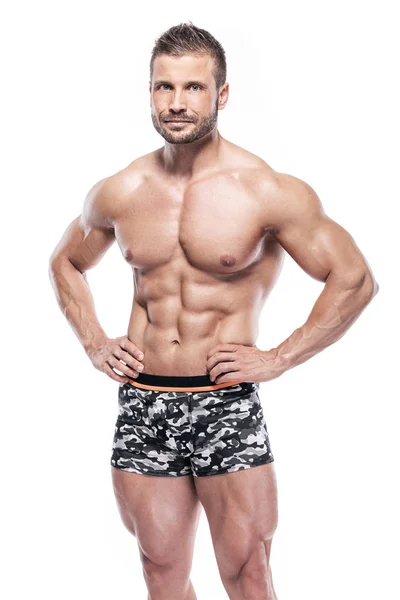 Mannen bodybuilder visar muskulös kropp — Stockfoto