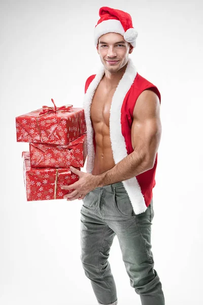 Sexy Kerl trägt Weihnachtsmann Klamotten — Stockfoto