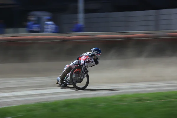 Speedway riders on the track in match — Stock fotografie