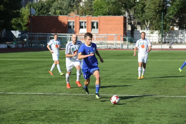 Aflevering van voetbalwedstrijd in Daugavpils — Stockfoto