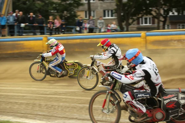 Speedway riders on the track — Stock Photo, Image