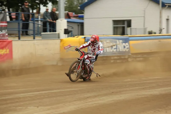 Speedway riders on the track — Stock Photo, Image