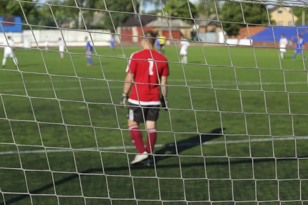 Achteraanzicht van voetbal keeper — Stockfoto