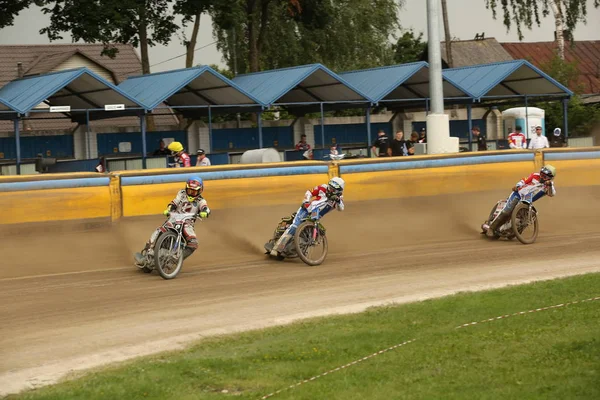 Speedway riders on the track — Stock Photo, Image