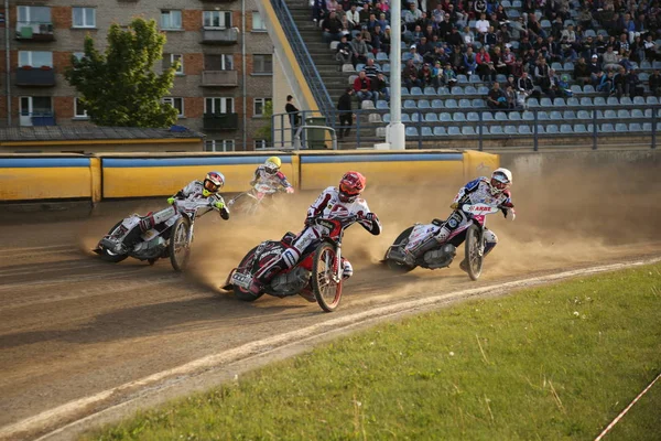 Speedway riders on the track — Stock Photo, Image