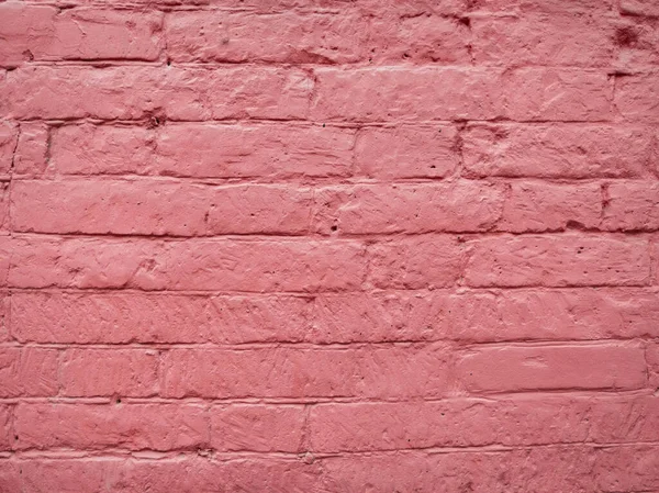 pink brick wall on the street