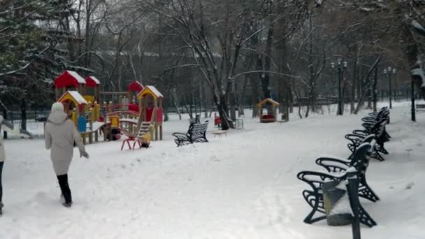 Girls Run Playground Teenagers Play Snowy Weather Snowing — Stock Video